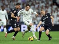 爱游戏体育下载-包含皇马门将表演神勇，多次关键扑球力挽狂澜的词条